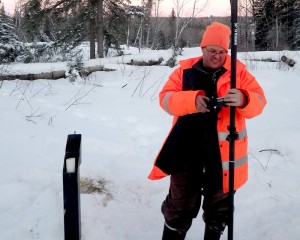 surveyor checking equipment