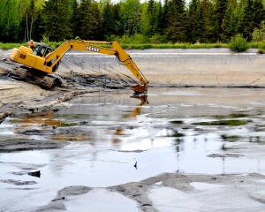 Sampling in a tailings pond