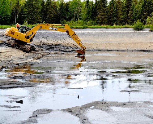 Sampling in a tailings pond